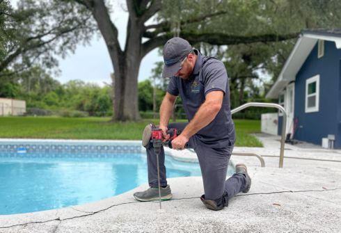The LUX team lifting an uneven floor with concrete repair services in Florida, restoring surfaces for added safety and stability.