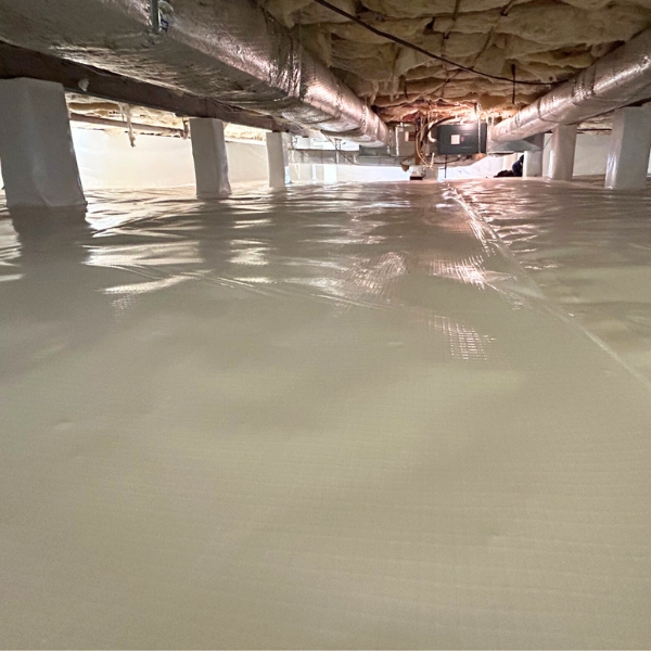 Clean and sealed area with a vapor barrier after crawl space encapsulation in Gainesville, FL, to prevent moisture and mold in a home.