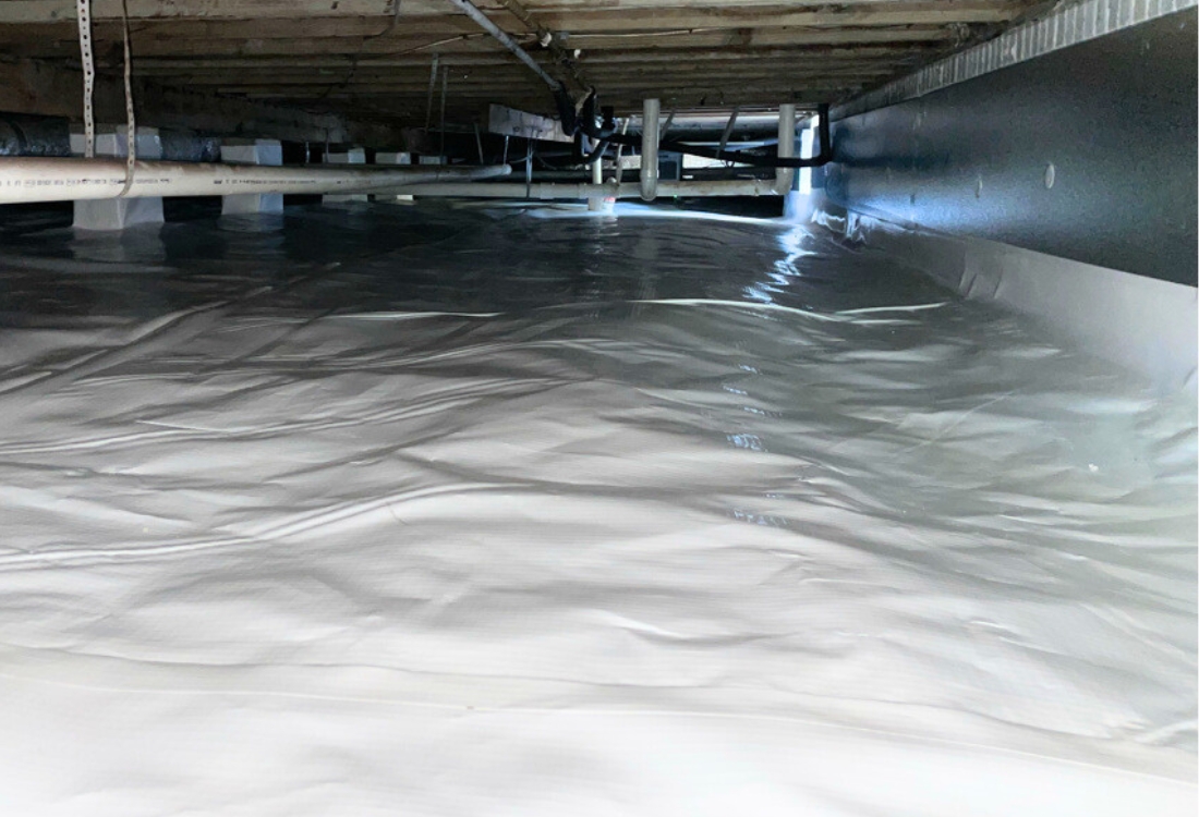 Fully encapsulated crawl space, dry and sealed against water intrusion after wet crawl space repair in Jacksonville, Florida.