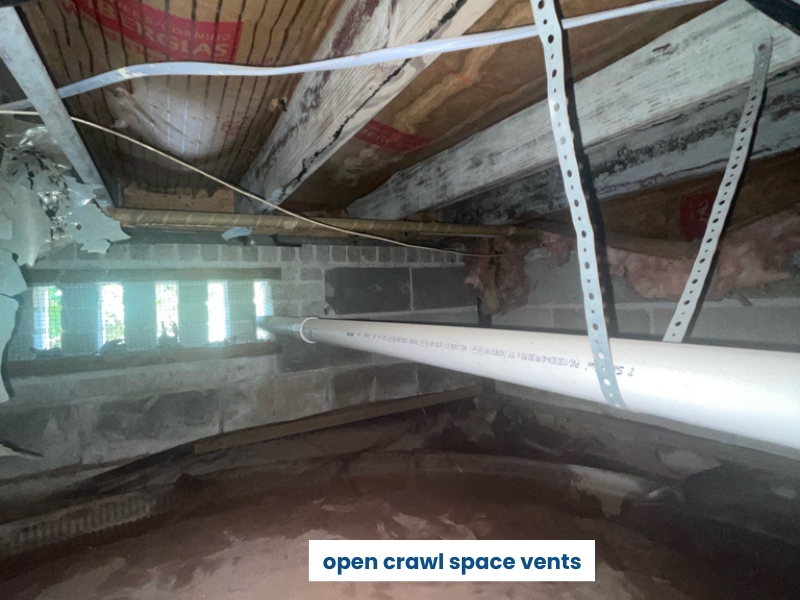 Open crawl space vents allow humid outdoor air to enter and contribute to the wet crawl space problem in Ocala, FL.