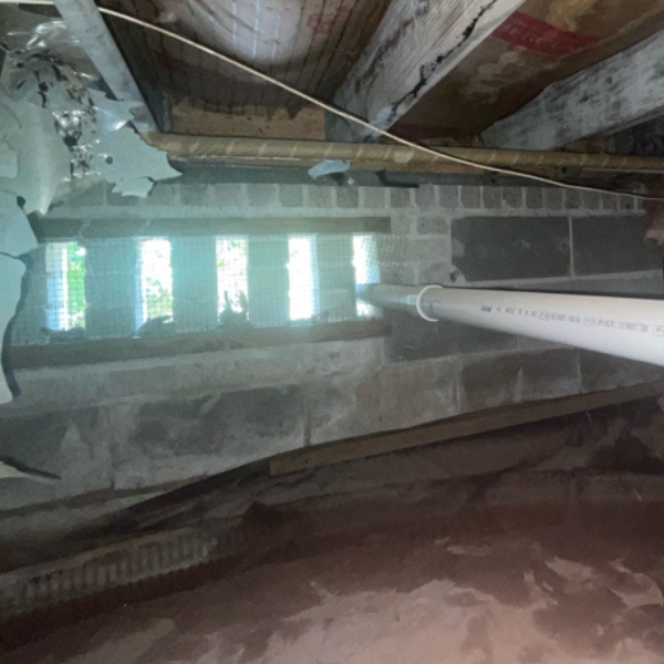 Damaged insulation, torn vapor barrier, and unsealed crawl space vents in Ocala, FL, leading to moisture and pest issues.