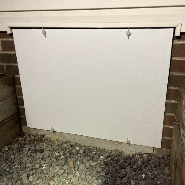 Installed crawl space door in Jacksonville, FL, providing secure, moisture-resistant access to the crawl space.