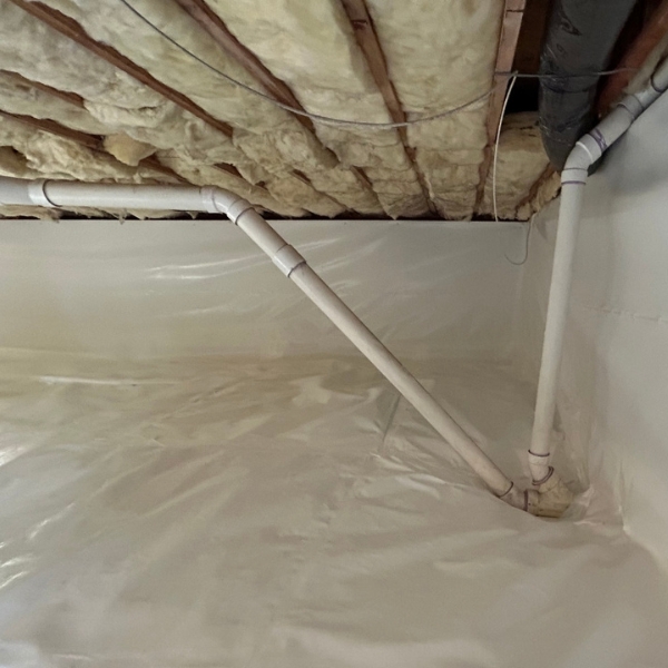 A sump pump installed in a newly waterproofed crawl space in Jacksonville, FL, ensuring moisture control.