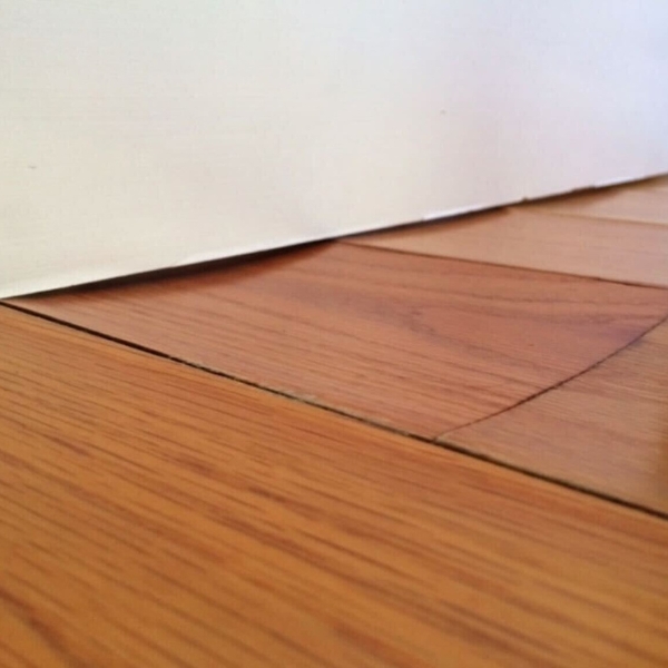 Springy wood floor caused by crawl space moisture and deteriorated floor joists, needing bouncy floor repair in Northern Florida.