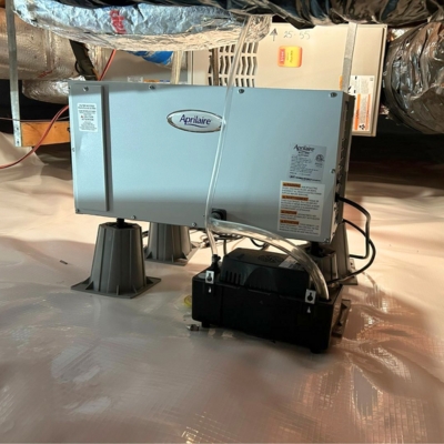 Dehumidifier installed to control humidity and mold in sealed crawl space, a wet crawl space repair in Jacksonville, FL.