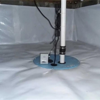 Drainage trench system installed beneath to control moisture, a wet crawl space repair in Fernandina Beach, FL.