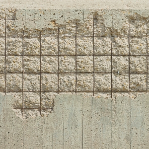Spalling concrete wall from freeze-thaw cycles causes chipping of concrete in Middleburg, FL.