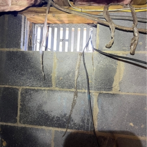 Open crawl space vent leading to moisture intrusion that can lead to crawl space foundation wall cracks in Palatka, FL.