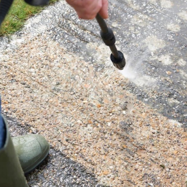 Applying Prime Protect SWR sealer to shield concrete from moisture and stains, a concrete repair solution in Gainesville, FL.