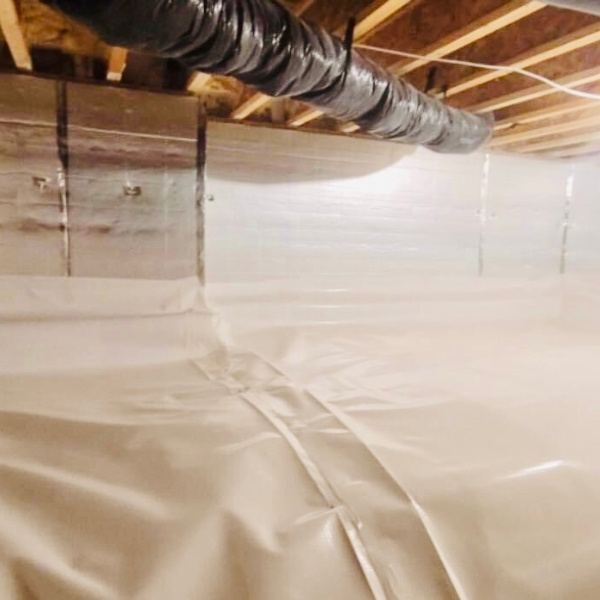 Insulation installed on crawl space walls to regulate temperature and reduce humidity, a crawlspace solution in Palm Coast, FL.