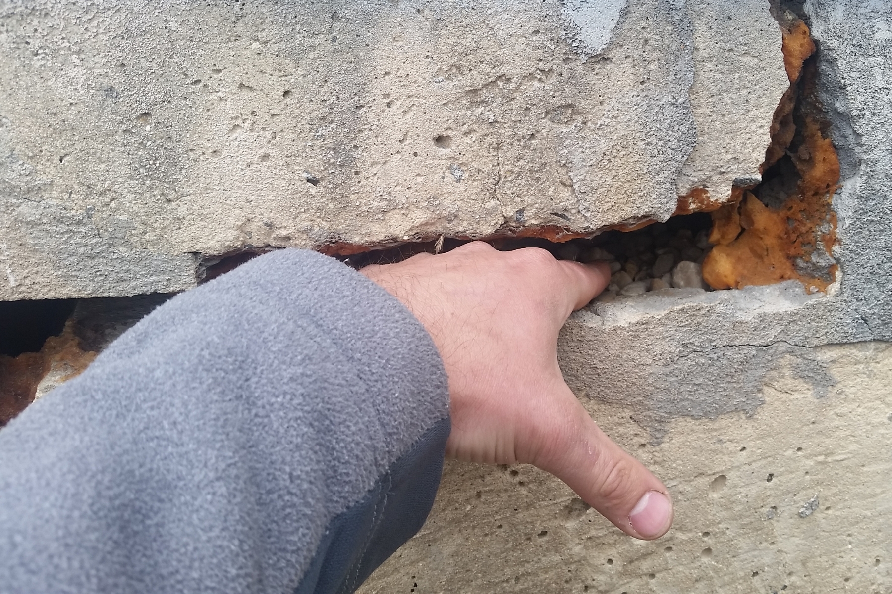 A huge foundation crack in a home’s wall due to hydrostatic pressure, causing foundation damage in Ocala, FL.