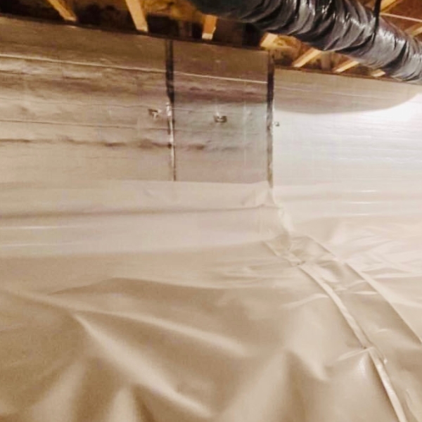 Rigid moisture-resistant insulation on a wall to help control humidity, a crawl space venting solution in Fort Lauderdale, FL.