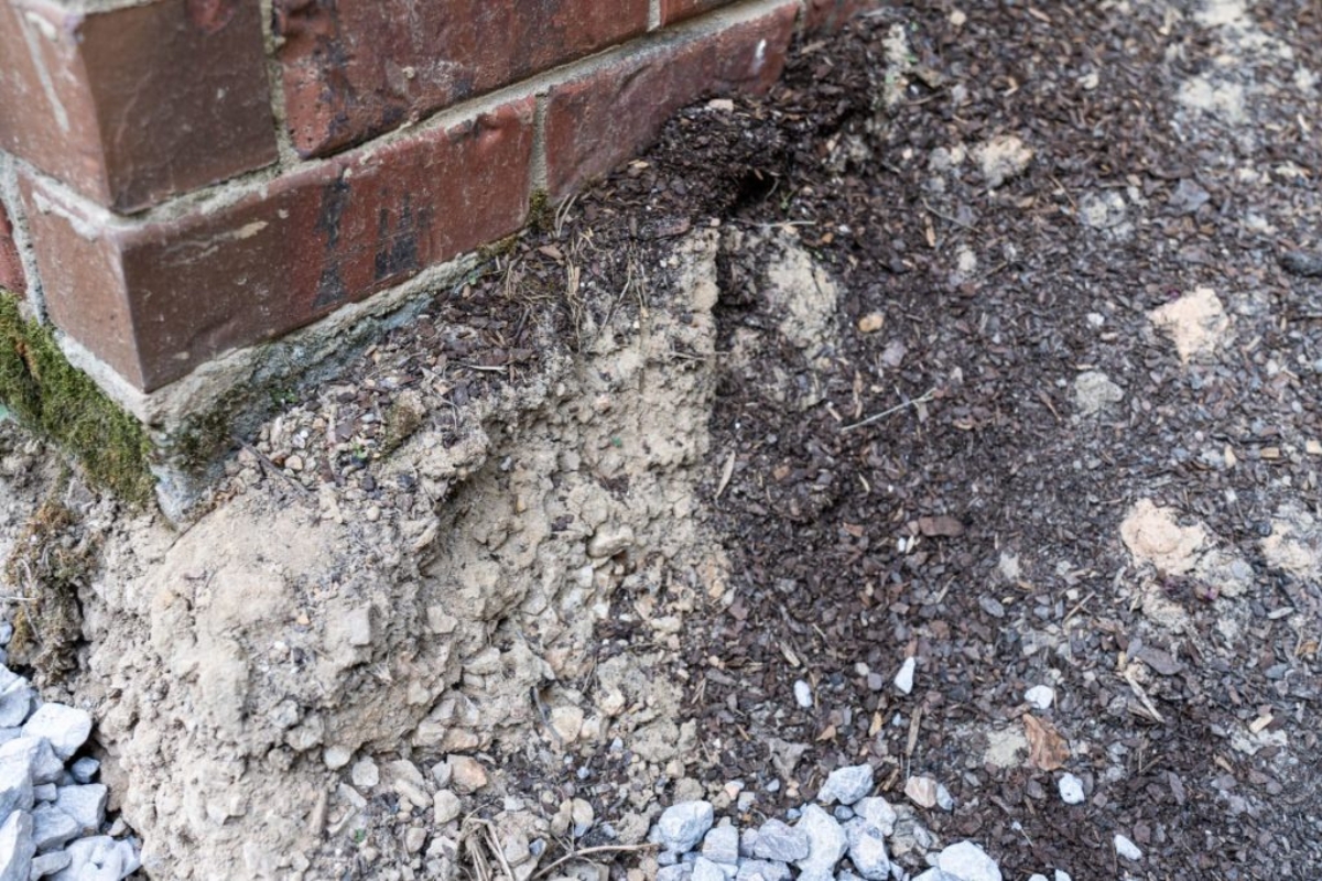 Loose sandy soil at a home site, showing how naturally weak ground leads to poor soil compaction in St.Augustine, FL.