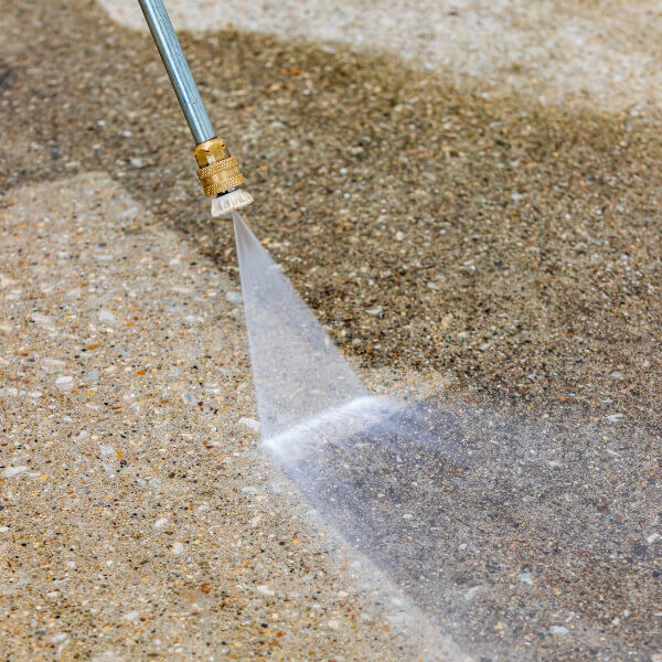 Protective concrete sealer applied to a driveway to block chemical absorption, a concrete chemical damage solution in Palatka, FL.