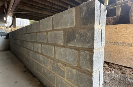 Foundation wall replacement project at a property addressing long-term structural wear, a foundation repair solution in Palm Coast.