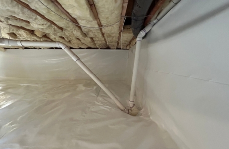 Crawl space waterproofing system installed in Lake City, FL, to help control moisture beneath the home.