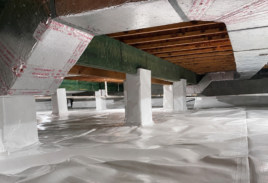 Completed crawl space encapsulation with vapor barrier, a clean space that makes the encapsulation cost worth it in Gainesville, FL.